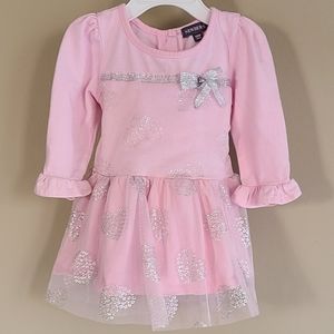 Light pink long sleeved dress with heart print sheer attached skirt